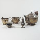 An Edwardian silver three piece tea set, of faceted circular shape, comprising a teapot, 14cm high,