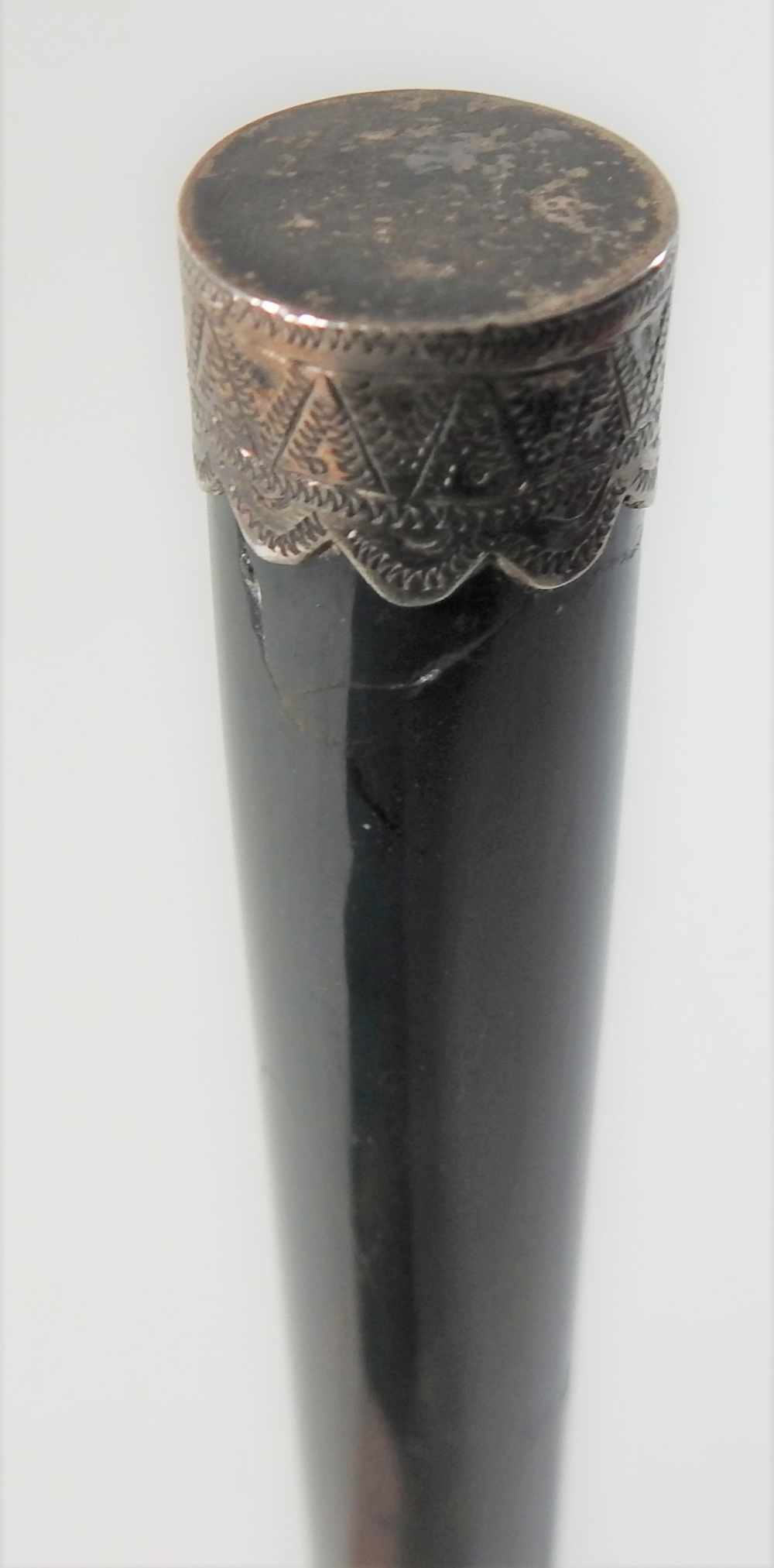 An early 20th century Indian bloodstone rest, with finely engraved white metal ends, - Image 2 of 3