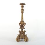 A Venetian style carved wooden table lamp base, with carved decoration, on a scrolled tripod base,