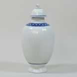 An 18th century Worcester porcelain blue and white tea canister, circa 1780, of fluted ovoid shape,