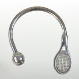 A Tiffany & Co silver key ring, in the form of a curved tennis racquet, 4cm,