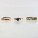 An 18 carat gold sapphire and diamond three stone ring, size M/N, together with a wedding band,