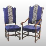 A set of fourteen oak blue upholstered high back dining chairs, of 17th century style,