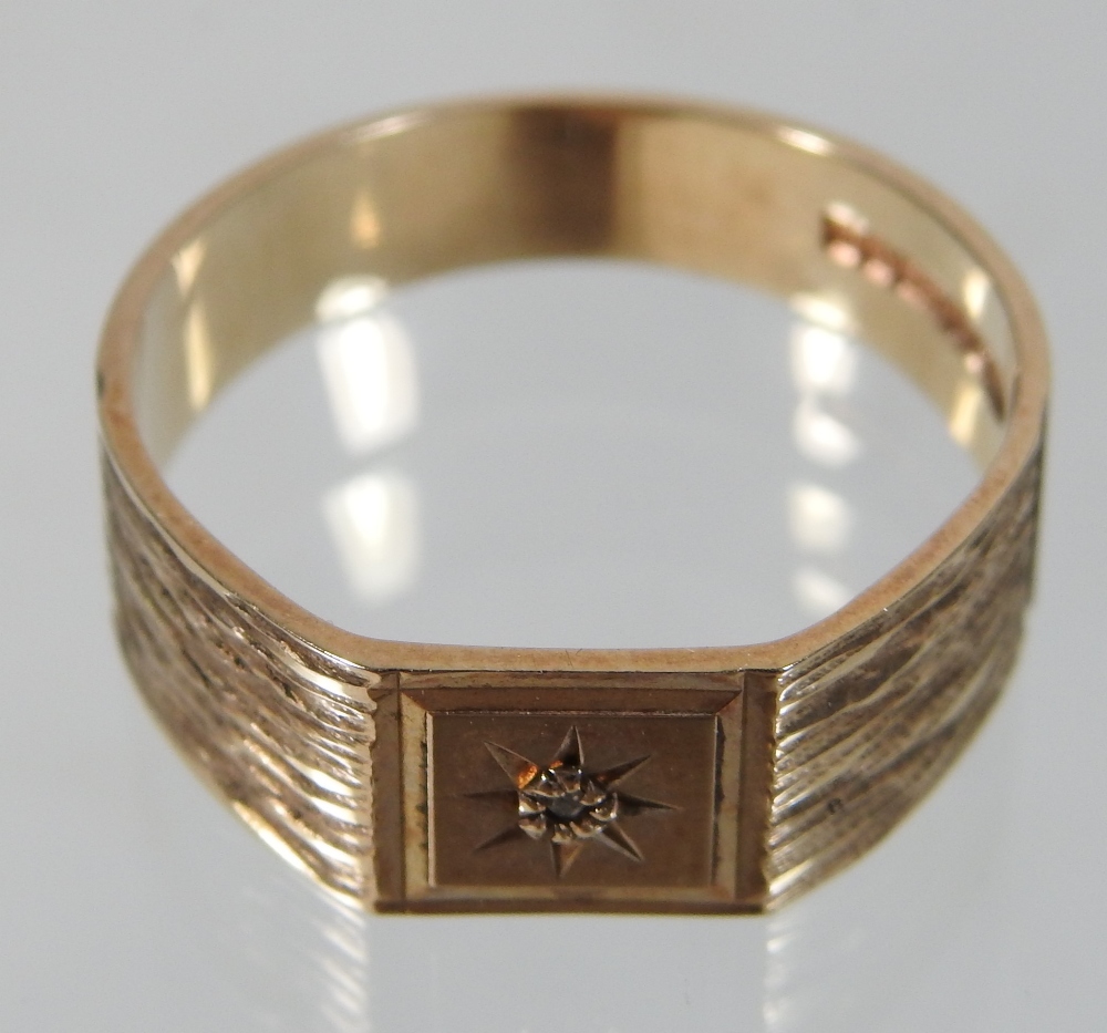 A 9 carat gold gentleman's gypsy ring, with textured shoulders, 6g gross, - Image 5 of 5