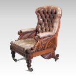 An impressive 19th century brown leather upholstered reclining armchair,