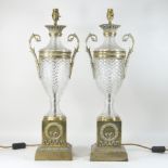 A pair of large Neoclassical cut glass brass mounted table lamp bases, each of urn shape,
