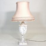A large early 20th century turned marble table lamp base, of baluster form, with shade,
