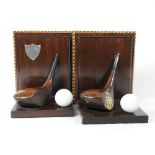 A pair of hand-made novelty bookends, of golfing interest, each decorated with a golf club and ball,
