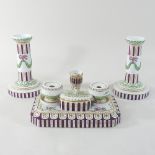 A mid 20th century Royal Copenhagen porcelain desk set, each piece painted with coloured flowers,