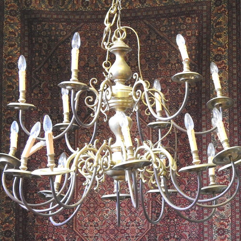 An early 20th century Dutch brass eighteen branch chandelier, of large proportions,