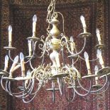 An early 20th century Dutch brass eighteen branch chandelier, of large proportions,