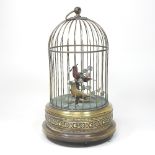 A clockwork birdcage automaton, with two singing birds, in a metal cage,