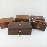 A Regency mahogany, boxwood strung and inlaid tea caddy, of sarcophagus shape, 28cm,