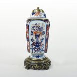 A 19th century Imari porcelain lamp base, of square shape, decorated with flowers,