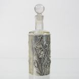 A 19th century silver mounted glass scent bottle, of faceted shape, with a removable stopper,