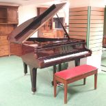 A late 20th century Offenbach boudoir baby grand piano, on square legs, numbered G028227,