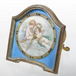 An early 20th century Swiss Boudoir strut clock, having an arched case,