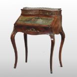 An early 20th century French rosewood Bonheur du Jour, of serpentine shape,