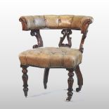 A William IV carved oak and leather upholstered desk chair, with a curved back and buttoned seat,