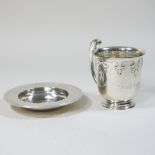 An early 20th century silver christening mug, inscribed 'Anoid Satiety', dated 1914,