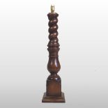 A turned oak table lamp base,