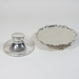 An early 20th century silver waiter, of circular shape, with a piecrust border, Sheffield 1933,