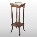 An early 20th century French walnut plant stand, having a white marble top,