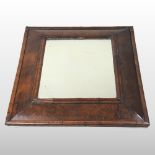 A late 17th century oyster laburnum veneered cushion framed wall mirror, the rectangular plate,