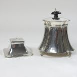 An Edwardian silver tea caddy, of tapered shape, on scrolled feet, Birmingham 1903, 196g gross,