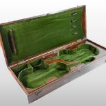 A George III mahogany violin case, of domed shape, with a hinged lid and brass carrying handle,