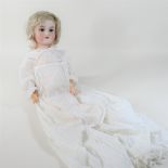 An early 20th century German Armand Marseilles bisque headed doll, stamped no.
