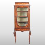 An early 20th century French floral marquetry display cabinet,