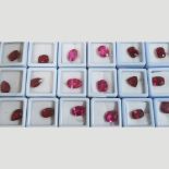 A collection of unmounted gemstones