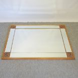 A gilt framed sectional wall mirror,