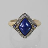 A 9 carat gold lapis lazuli and diamond ring, boxed,