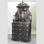 An early 20th century Hong Kong painted dressing chest, with a mirrored back,
