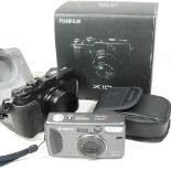 A Carl Zeiss Kyocera camera, cased,
