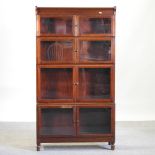 An early 20th century Minty glazed sectional bookcase, of Globe Wernicke style,