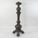 An ornate 19th century bronze table lamp base, with scrolled decoration,