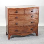 A Victorian mahogany and ebony strung bow front chest,