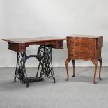 A 1930's walnut side table, 55cm, together with a vintage sewing machine table,