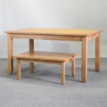 A modern light oak dining table, 150 x 90cm,