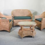 A wicker conservatory suite, comprising a sofa, 117cm,