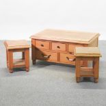 A pine coffee table, containing short drawers, 94cm,