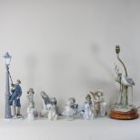 A large Lladro porcelain figure of a lamplighter, 48cm high,