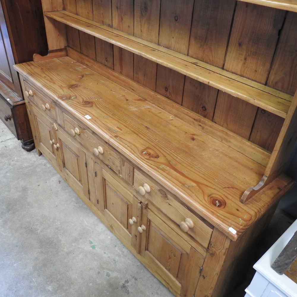 A pine dresser, the plate rack above drawers and cupboards, - Image 5 of 6