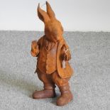 A rusted metal model of Mr Rabbit,