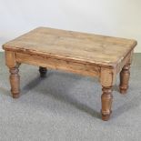 A rustic pine coffee table,