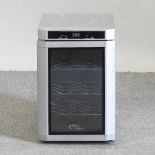 A NScessity six bottle wine fridge,