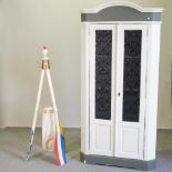 A cream painted standing corner cabinet, 100cm, together with a painted wooden stand,